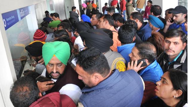 Passengers jostling to reschedule their tickets after GoAir, Jet Airways and IndiGo cancelled nine flights at the Chandigarh international Airport on Wednesday. (Ravi Kumar/HT) Passengers jostling to reschedule their tickets after GoAir, Jet Airways and IndiGo cancelled nine flights at the Chandigarh international Airport on Wednesday. (Ravi Kumar/HT)