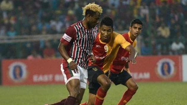 File image of Mohun Bagan's Sony Norde (L) being tackled by East Bengal's Willis Deon Plaza (C) as Mehtab Hossain looks on. (AFP/Getty Images) File image of Mohun Bagan's Sony Norde (L) being tackled by East Bengal's Willis Deon Plaza (C) as Mehtab Hossain looks on. (AFP/Getty Images)