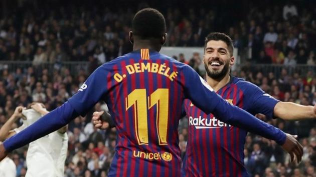 Barcelona's Luis Suarez celebrates their second goal with Ousmane Dembele.(REUTERS)