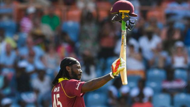 Chris Gayle of West Indies celebrates achieving 10,000 ODI runs during the 4th ODI between West Indies and England at Grenada National Cricket Stadium.(AFP) Chris Gayle of West Indies celebrates achieving 10,000 ODI runs during the 4th ODI between West Indies and England at Grenada National Cricket Stadium.(AFP)