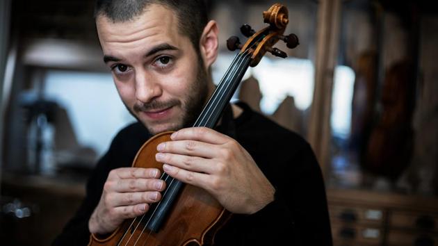 Wiedmer may still only be 29, but he has already made his reputation as a master craftsman. One of his violins won gold at the Violin Society of America’s international competition last year. With friend and collaborator Damien Gest, he won gold for one of their cellos. And in the same competition, he picked up silver for his workmanship on a viola. (Jeff Pachoud / AFP) Wiedmer may still only be 29, but he has already made his reputation as a master craftsman. One of his violins won gold at the Violin Society of America’s international competition last year. With friend and collaborator Damien Gest, he won gold for one of their cellos. And in the same competition, he picked up silver for his workmanship on a viola. (Jeff Pachoud / AFP)