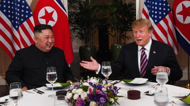 US President Donald Trump (R) and North Korea's leader Kim Jong un sit for a dinner at the Sofitel Legend Metropole hotel in Hanoi on February 27, 2019. During the brief meeting yesterday Trump showered adulations on host Vietnam and maintained satisfaction with the pace of events since the first summit. (Saul Loeb / AFP)