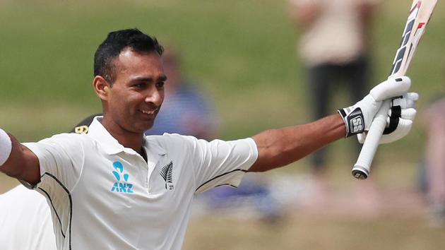 New Zealand's Jeet Raval celebrates his century during day two of the first cricket Test match between New Zealand and Bangladesh at Seddon Park.(AFP)