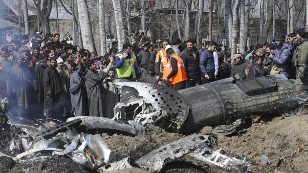 Two pilots were killed after an Indian Air Force M-17 chopper crashed in Kashmir’s Budgam district on Wednesday. Pakistani Air Force entered Indian air space as part of ‘retaliatory’ action against India’s airstrikes. Pakistan claimed that it had two IAF pilots in its custody with the Pakistan Army later releasing a video that showed an IAF pilot identifying himself as Wg Cdr Abhinandan. (Waseem Andrabi / HT Photo)