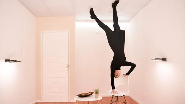 A visitor poses for a picture in the “Rotated Room” of the Museum of Illusions in Pristina. The museum contains a series of optical illusions giving the visitor the chance to produce unusual 3D images of themselves. (Armend Nimani / AFP) A visitor poses for a picture in the “Rotated Room” of the Museum of Illusions in Pristina. The museum contains a series of optical illusions giving the visitor the chance to produce unusual 3D images of themselves. (Armend Nimani / AFP)
