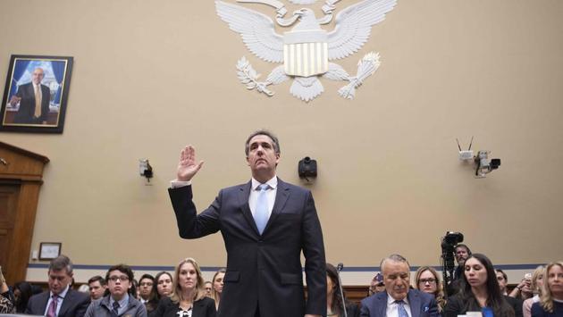 Michael Cohen, US President Donald Trump’s former personal attorney, is sworn in to testify before the House Oversight and Reform Committee in the Rayburn House Office Building on Capitol Hill in Washington, DC. (Jim Watson / AFP) Michael Cohen, US President Donald Trump’s former personal attorney, is sworn in to testify before the House Oversight and Reform Committee in the Rayburn House Office Building on Capitol Hill in Washington, DC. (Jim Watson / AFP)