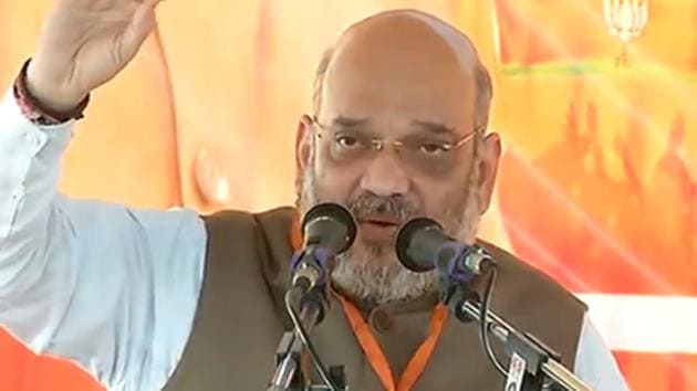 BJP president Amit Shah addressing party workers at Umaria, Madhya Pradesh before launching a bike rally on Saturday.(Photo: Twitter/@BJP4India)