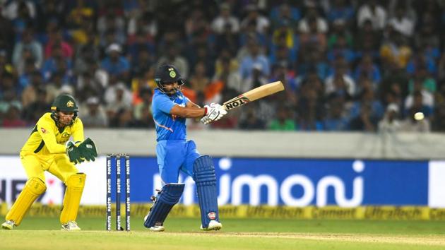 Kedar Jadhav plays a shot during the first ODI against Australia. (AFP)
