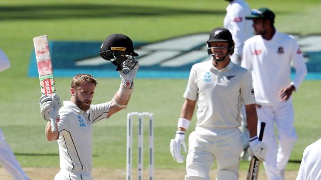 New Zealand's Kane Williamson celebrates his century (100 runs) during day three of the first cricket Test match between New Zealand and Bangladesh.(AFP)