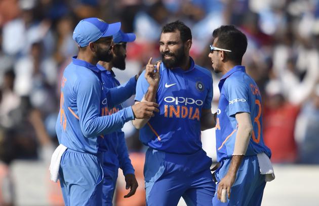 Mohammed Shami (centre) celebrates the dismissal of Glenn Maxwell. (PTI)
