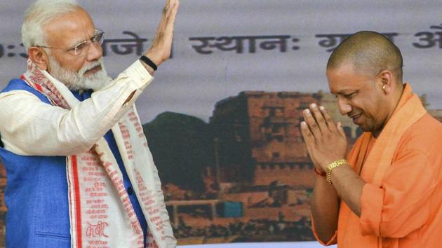 Prime Minister Narendra Modi with Uttar Pradesh Chief Minister Yogi Adityanath during a programme in Varanasi, Tuesday, Feb 19, 2019. (PTI file photo) Prime Minister Narendra Modi with Uttar Pradesh Chief Minister Yogi Adityanath during a programme in Varanasi, Tuesday, Feb 19, 2019. (PTI file photo)