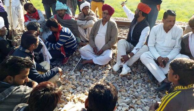 Gujjar leader Kirori Singh Bainsla with Gujjar brothers ongoing Gujjar Reservation agitation at Malarna Dungar railway track in Sawai Madhopur (File) Gujjar leader Kirori Singh Bainsla with Gujjar brothers ongoing Gujjar Reservation agitation at Malarna Dungar railway track in Sawai Madhopur (File)