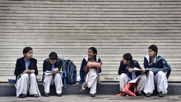Students ahead of Central Board of Secondary Education (CBSE) board 12th standard English exam outside an examination centre, Govt. Sarvodaya Kanya Vidyalaya No. 1, Gandhi Nagar, in New Delhi. (Sonu Mehta / HT Photo) 