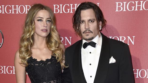 In this Jan. 2, 2016, file photo, Amber Heard, left, and Johnny Depp arrive at the 27th annual Palm Springs International Film Festival Awards Gala in Palm Springs, Calif.(Jordan Strauss/Invision/AP) In this Jan. 2, 2016, file photo, Amber Heard, left, and Johnny Depp arrive at the 27th annual Palm Springs International Film Festival Awards Gala in Palm Springs, Calif.(Jordan Strauss/Invision/AP)