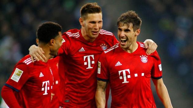 Bayern Munich's Javi Martinez celebrates scoring their first goal with team mates.(REUTERS)