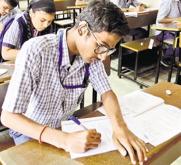 Stone deaf students appear for SSC examination at Modern School, on Saturday.(HT Photo)
