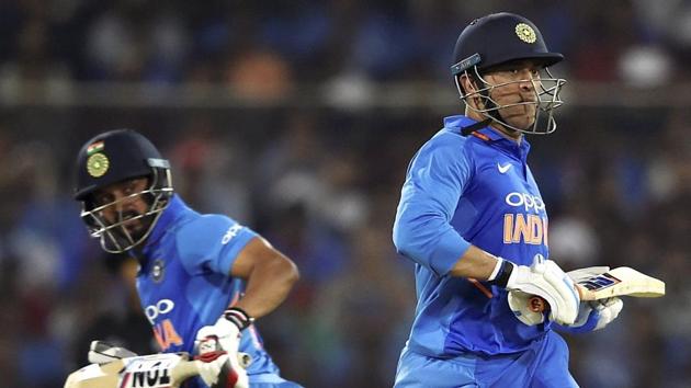 MS Dhoni and Kedar Jadhav run between the wickets during the first ODI against Australia.(PTI)