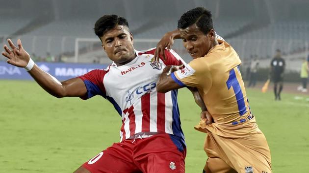 File photo of Mumbai City FC player Pranjal Bhumij (in yellow) and ATK's Pritam Kotal in action.(PTI) File photo of Mumbai City FC player Pranjal Bhumij (in yellow) and ATK's Pritam Kotal in action.(PTI)