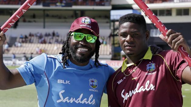 West Indies' Chris Gayle, left, and teammate Oshane Thomas show the stumps after beating England by seven wickets on the fifth One Day International cricket match. (AP) West Indies' Chris Gayle, left, and teammate Oshane Thomas show the stumps after beating England by seven wickets on the fifth One Day International cricket match. (AP)