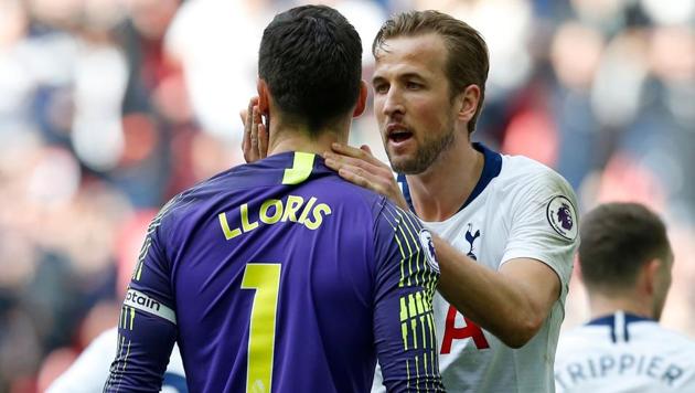 Tottenham Hotspur's English striker Harry Kane congratulates Tottenham Hotspur's French goalkeeper Hugo Lloris (L) after he saves a penalty from Aubameyang during the English Premier League football match between Tottenham Hotspur and Arsenal at Wembley Stadium in London, on March 2, 2019 (AFP) Tottenham Hotspur's English striker Harry Kane congratulates Tottenham Hotspur's French goalkeeper Hugo Lloris (L) after he saves a penalty from Aubameyang during the English Premier League football match between Tottenham Hotspur and Arsenal at Wembley Stadium in London, on March 2, 2019 (AFP)