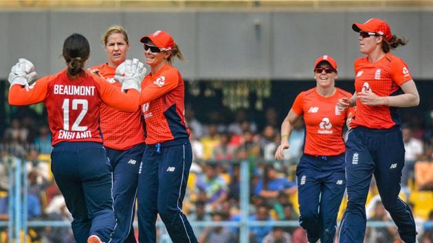 England players celebrate after dismissing an India batswoman during the first T20I in Guwahati. (PTI) England players celebrate after dismissing an India batswoman during the first T20I in Guwahati. (PTI)