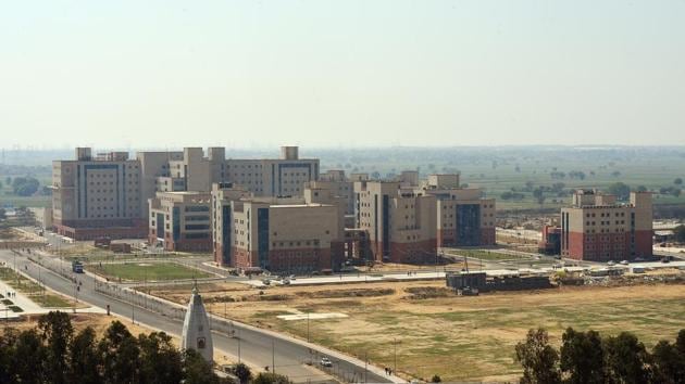 An aerial view of newly constructed All India Institutes of Medical Sciences (AIIMS) at Jhajjar, Haryana that houses the National Cancer Institure (NCI). The NCI is the first in a nationwide grid of high-end public hospitals being developed to offer affordable and quality cancer treatment at the district level. (Amal KS / HT Photo) An aerial view of newly constructed All India Institutes of Medical Sciences (AIIMS) at Jhajjar, Haryana that houses the National Cancer Institure (NCI). The NCI is the first in a nationwide grid of high-end public hospitals being developed to offer affordable and quality cancer treatment at the district level. (Amal KS / HT Photo)