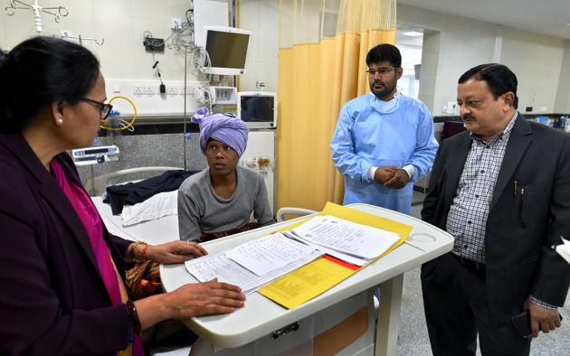 Dr Sushma Bhatnagar and Dr SVS Deo with patient Manoj Ram from Bihar. NCI is not only the most advanced cancer centre in the public sector, it’s also the cheapest. While registration costs ₹10, ‘short’ admission charges are ₹60 for one day, and ‘long’ admission of six days or more costs ₹365. (Amal KS / HT Photo) Dr Sushma Bhatnagar and Dr SVS Deo with patient Manoj Ram from Bihar. NCI is not only the most advanced cancer centre in the public sector, it’s also the cheapest. While registration costs ₹10, ‘short’ admission charges are ₹60 for one day, and ‘long’ admission of six days or more costs ₹365. (Amal KS / HT Photo)