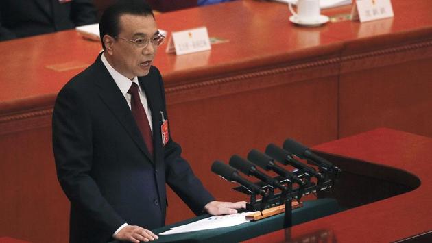 Li Keqiang delivers the work reports at the opening session of the China’s National People’s Congress. The premier promised to “promote China-US trade negotiations,” but gave no details of talks aimed at ending the fight with President Donald Trump over Beijing’s technology ambitions and complaints it steals or pressures companies to hand over technology. (Andy Wong / AP) Li Keqiang delivers the work reports at the opening session of the China’s National People’s Congress. The premier promised to “promote China-US trade negotiations,” but gave no details of talks aimed at ending the fight with President Donald Trump over Beijing’s technology ambitions and complaints it steals or pressures companies to hand over technology. (Andy Wong / AP)