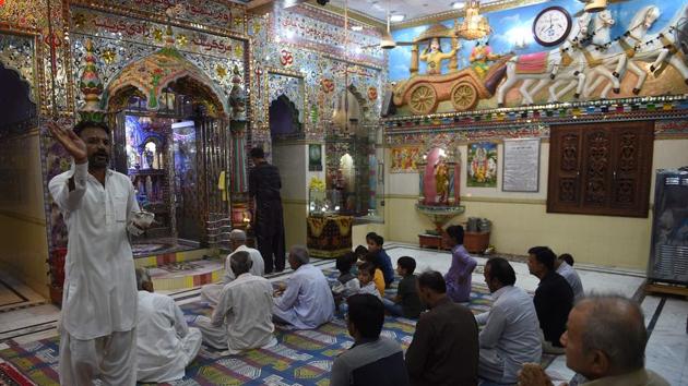 Pakistani Hindu pray at the Shri Krishna Temple in Mithi, some 320 km from Karachi.(AFP File)