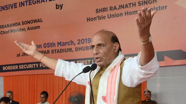 Assam, March 05 (ANI): Union Home Minister Rajnath Singh addresses during a public meeting at Jhagrarpar Stadium in Dhubri on Tuesday. (ANI Photo) (Lal Singh) Assam, March 05 (ANI): Union Home Minister Rajnath Singh addresses during a public meeting at Jhagrarpar Stadium in Dhubri on Tuesday. (ANI Photo) (Lal Singh)
