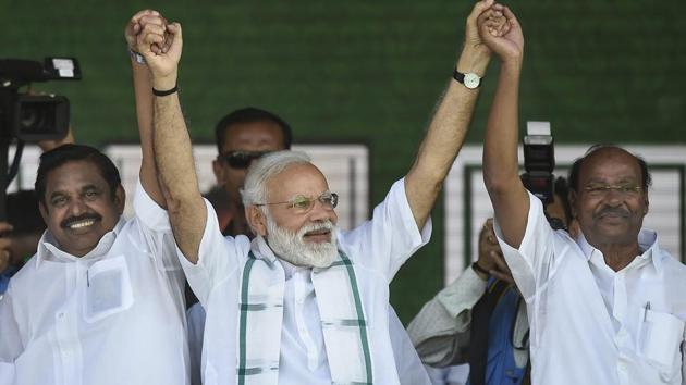 Prime Minister Naredra Modi, Tamil Nadu Chief Minister K Palaniswami and PMK founder Ramadoss join hands during a public rally of the BJP-AIADMK-PMK alliance, in Chennai, Wednesday. (PTI) Prime Minister Naredra Modi, Tamil Nadu Chief Minister K Palaniswami and PMK founder Ramadoss join hands during a public rally of the BJP-AIADMK-PMK alliance, in Chennai, Wednesday. (PTI)