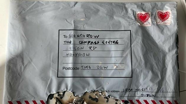 Britain's Metropolitan Police show a suspect package after it ignited. The package was recovered from the Heathrow airport, one of the three places where bombs were found on March 5.(AP)