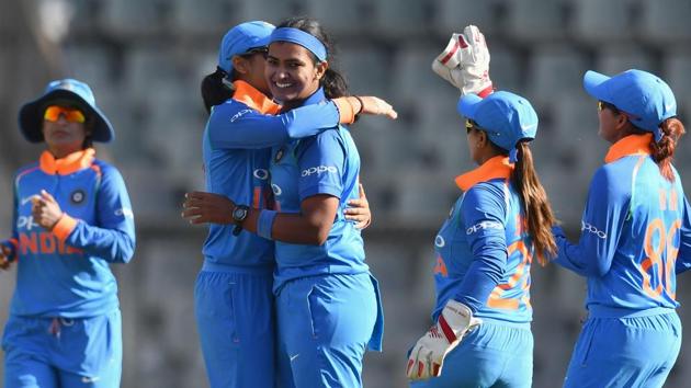 File image of players of Indian women’s cricket team celebrating the fall of a wicket(AFP)