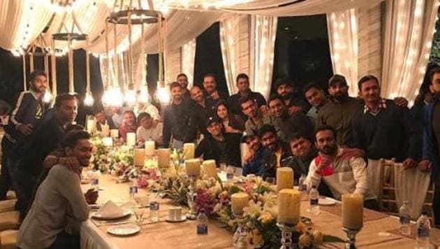 Indian cricket team players and support staff pose for a photograph during a dinner party hosted by MS Dhoni in Ranchi.(Twitter/Yuzvendra Chahal)