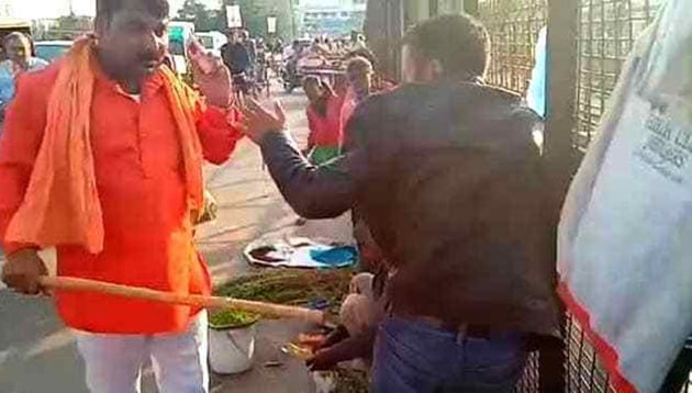 Singh said the incident was reported to the local police after the video of the attack went viral on the social media late on Wednesday night. He said an FIR against unidentified men was registered in the matter and Sonker was arrested. He said Sonker was seen holding a stick in the viral video. (Screengrab) Singh said the incident was reported to the local police after the video of the attack went viral on the social media late on Wednesday night. He said an FIR against unidentified men was registered in the matter and Sonker was arrested. He said Sonker was seen holding a stick in the viral video. (Screengrab)