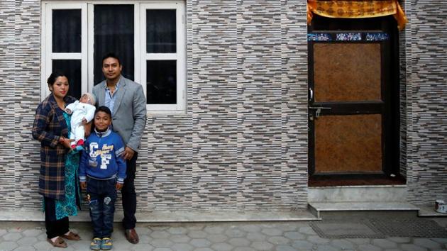 Jenny Shrestha, a supervisor at Prime Commercial Bank LTD, holds her three-months-old son Aayan with family, in the week she resumed work in Kathmandu, Nepal. Jenny was on a maternity leave for two months. The statutory leave in Nepal is 98 days. “I fell very sad because... it's very hard to leave him”, Jenny said. She said her mother and sister will help take care of her baby. (Navesh Chitrakar / REUTERS) Jenny Shrestha, a supervisor at Prime Commercial Bank LTD, holds her three-months-old son Aayan with family, in the week she resumed work in Kathmandu, Nepal. Jenny was on a maternity leave for two months. The statutory leave in Nepal is 98 days. “I fell very sad because... it's very hard to leave him”, Jenny said. She said her mother and sister will help take care of her baby. (Navesh Chitrakar / REUTERS)
