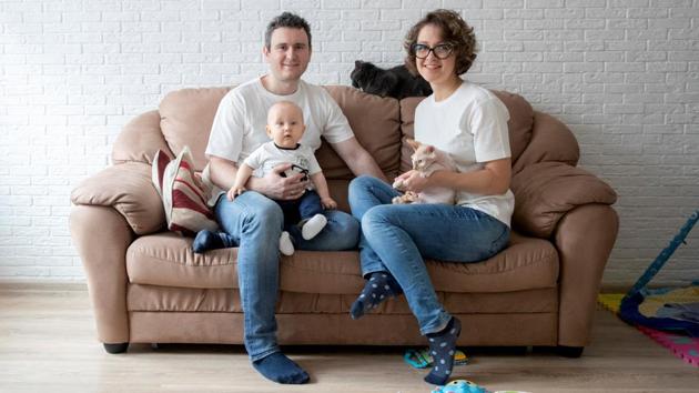 Natalia Bulgakova, a lawyer at a consulting company, her husband, and their seven-month-old son Gleb in Moscow, Russia. Natalia has been on maternity leave for nine months and is going back to work in second half of March. Statutory maternity leave in Russia can be as long as three years and can be claimed by any relative - a mother, father, grandmother, grandfather or child’s guardian. (Maxim Shemetov / REUTERS) Natalia Bulgakova, a lawyer at a consulting company, her husband, and their seven-month-old son Gleb in Moscow, Russia. Natalia has been on maternity leave for nine months and is going back to work in second half of March. Statutory maternity leave in Russia can be as long as three years and can be claimed by any relative - a mother, father, grandmother, grandfather or child’s guardian. (Maxim Shemetov / REUTERS)