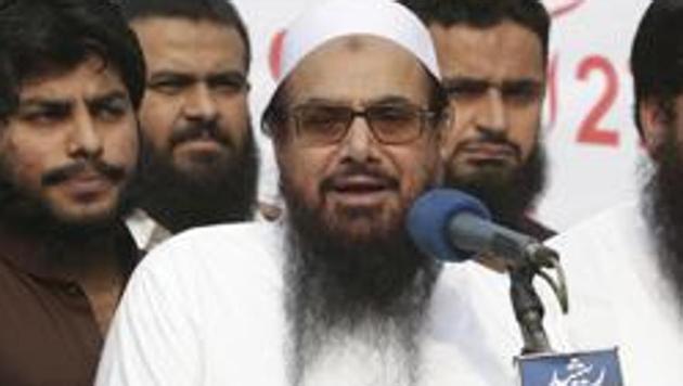 At least 56 seminaries and facilities being run by Mumbai terror attack mastermind Hafiz Saeed-led Jamaat-ud-Dawa and its wing Falah-e-Insaniat Foundation in Pakistan’s southern Sindh province have been taken over by authorities.(AP/File Photo)