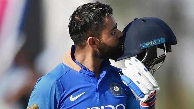 India's Virat Kohli celebrates century during the 2nd ODI cricket match against Australia at Vidarbha Cricket Association Stadium in Nagpur.(PTI)