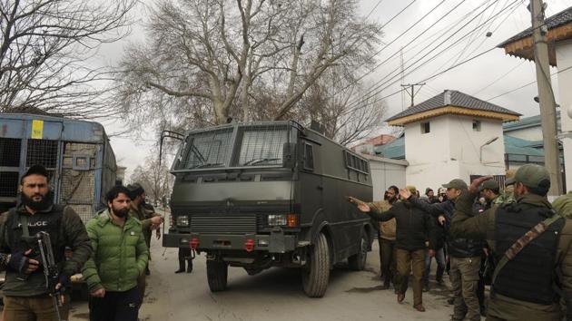 Jammu and Kashmir police shift Jammu and Kashmir Liberation Front (JKLF) chairman Yasin Malik inside a police vehicle after he was booked under Public Safety Act which allows for people to be held for up to two years without judicial intervention, at Lal Chowk, in Srinagar. Malik will be shifted to Kot Bhalwal jail on the outskirts of Srinagar. (Waseem Andrabi / HT Photo) Jammu and Kashmir police shift Jammu and Kashmir Liberation Front (JKLF) chairman Yasin Malik inside a police vehicle after he was booked under Public Safety Act which allows for people to be held for up to two years without judicial intervention, at Lal Chowk, in Srinagar. Malik will be shifted to Kot Bhalwal jail on the outskirts of Srinagar. (Waseem Andrabi / HT Photo)