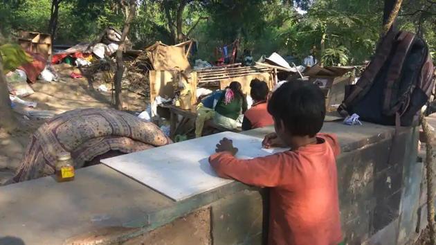 The Delhi Commission for Protection of Child Rights (DCPCR) on Thursday urged the Delhi government to give another chance to students who had missed their exam after their ’illegal’ homes near the Nehru Place Metro Station were demolished.(HT Photo)