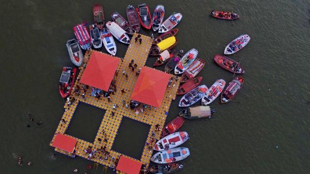 Boats tethered at Sangam, the confluence of sacred rivers Yamuna, the Ganges and the mythical Saraswati as devotees take holy dips on the auspicious day of Maha Shivratri during the last day of Kumbh Mela, in Prayagraj, Uttar Pradesh. (Rajesh Kumar Singh / AP) Boats tethered at Sangam, the confluence of sacred rivers Yamuna, the Ganges and the mythical Saraswati as devotees take holy dips on the auspicious day of Maha Shivratri during the last day of Kumbh Mela, in Prayagraj, Uttar Pradesh. (Rajesh Kumar Singh / AP)