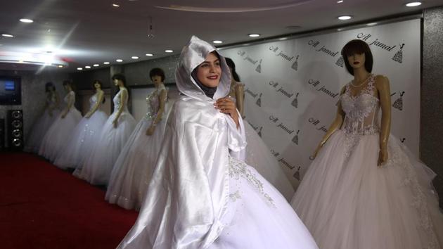 Some young women speak of struggles in their personal lives. They say shopping and even getting married is made difficult by the restrictions. Hana Abu El-Roos, 18, plans to get married this summer but can’t find items she needs in any of Gaza’s shops. “I haven’t picked my wedding dress yet,” said El-Roos, who is also busy preparing for her final high school exams. “I am confused. My sisters are helping me.” (Samar Abo Elouf / REUTERS) Some young women speak of struggles in their personal lives. They say shopping and even getting married is made difficult by the restrictions. Hana Abu El-Roos, 18, plans to get married this summer but can’t find items she needs in any of Gaza’s shops. “I haven’t picked my wedding dress yet,” said El-Roos, who is also busy preparing for her final high school exams. “I am confused. My sisters are helping me.” (Samar Abo Elouf / REUTERS)