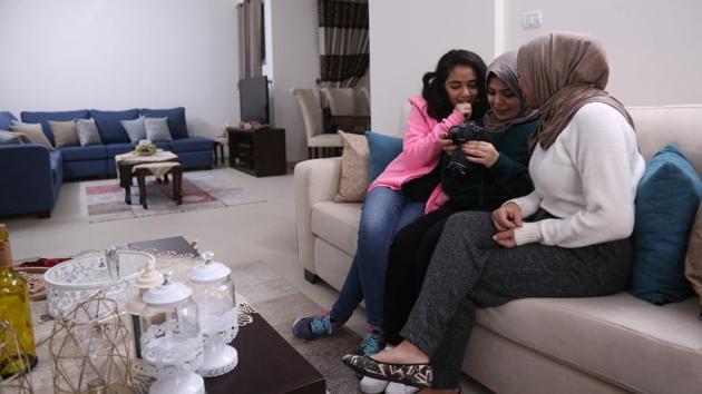 “It is an attempt to beat the physical blockade of Gaza,” Nada (C) said. Restrictions have devastated Gaza’s economy and left many of its women, like Rudwan’s younger sister, struggling to find work. “It is hard to find a job that will allow you take care of your needs,” said Lama Rudwan, 22, a media and communications graduate who joined her sister after an unsuccessful job search. (Samar Abo Elouf / REUTERS) “It is an attempt to beat the physical blockade of Gaza,” Nada (C) said. Restrictions have devastated Gaza’s economy and left many of its women, like Rudwan’s younger sister, struggling to find work. “It is hard to find a job that will allow you take care of your needs,” said Lama Rudwan, 22, a media and communications graduate who joined her sister after an unsuccessful job search. (Samar Abo Elouf / REUTERS)
