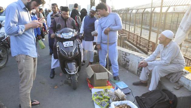 A Kashmiri vendor sells dry fruits, at Daliganj bridge, in Lucknow, Uttar Pradesh, India, on Friday, March 8, 2019.(Photo: Deepak Gupta / Hindustan Times)