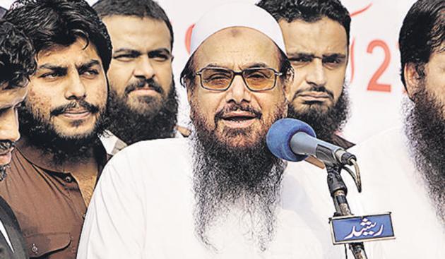 Pakistan authorities on Thursday sealed the Lahore headquarters of JuD and FIF and detained over 120 suspected militants as part of an ongoing crackdown on banned groups.(AP) Pakistan authorities on Thursday sealed the Lahore headquarters of JuD and FIF and detained over 120 suspected militants as part of an ongoing crackdown on banned groups.(AP)