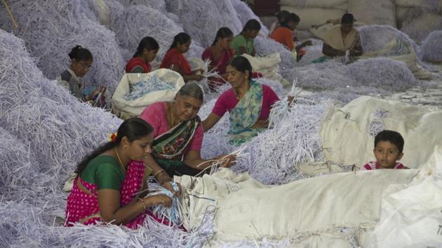 Women work at a paper recycling unit on International Women's Day, in Hyderabad, Telangana. (Mahesh Kumar A. / AP) Women work at a paper recycling unit on International Women's Day, in Hyderabad, Telangana. (Mahesh Kumar A. / AP)