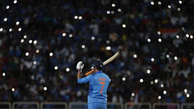 Mahendra Singh Dhoni prepares to bat during the third one day international cricket match between India and Australia in Ranchi, Jharkhand. (Aijaz Rahi / AP) Mahendra Singh Dhoni prepares to bat during the third one day international cricket match between India and Australia in Ranchi, Jharkhand. (Aijaz Rahi / AP)