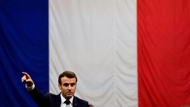 French President Emmanuel Macron gestures during a meeting as part of the “Great National Debate” in Greoux-les-Bains, southeastern France. The French president is carrying out a two-month debate which has seen dozens of town hall meetings held since the middle of January, as part of his response to the “yellow vest” protests. (Christophe Simon / AFP) 