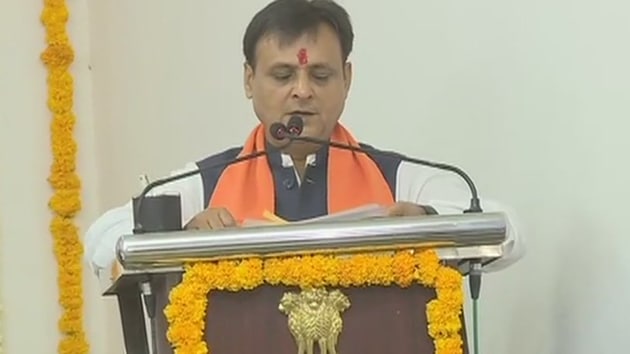 MLA Jawahar Chavda who resigned from Congress and joined BJP yesterday, takes oath as a minister in Gujarat government.(ANI/Twitter)